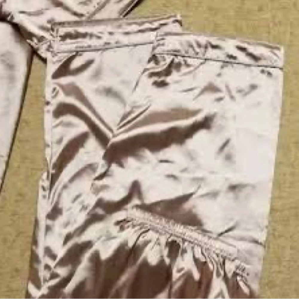 Multiple womens 2 piece Satin sleep wears.